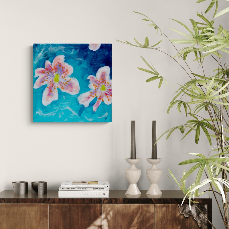 Vivid Melody I by Sue Mac Dougall shown in a modern interior abstract floral painting in ocean blues with resin finish and gold mirrored edges