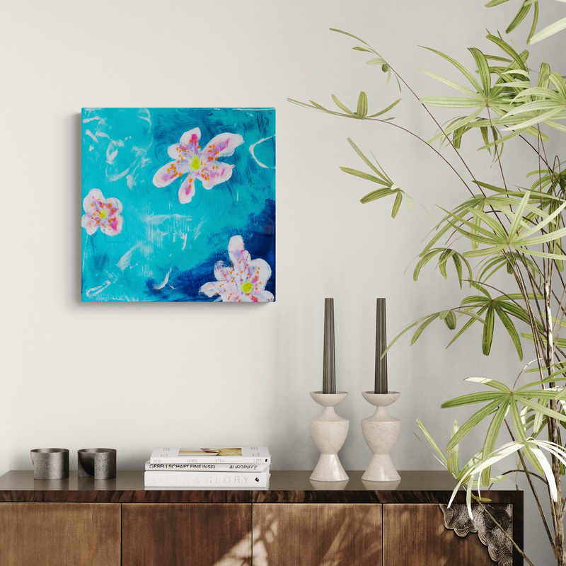 Vivid Melody II by Sue Mac Dougall shown in a modern interior abstract floral painting in ocean blues with resin finish and gold mirrored edges